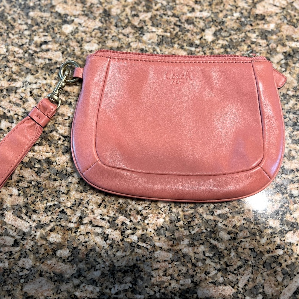 Coach - Vintage wristlet with detachable strap.